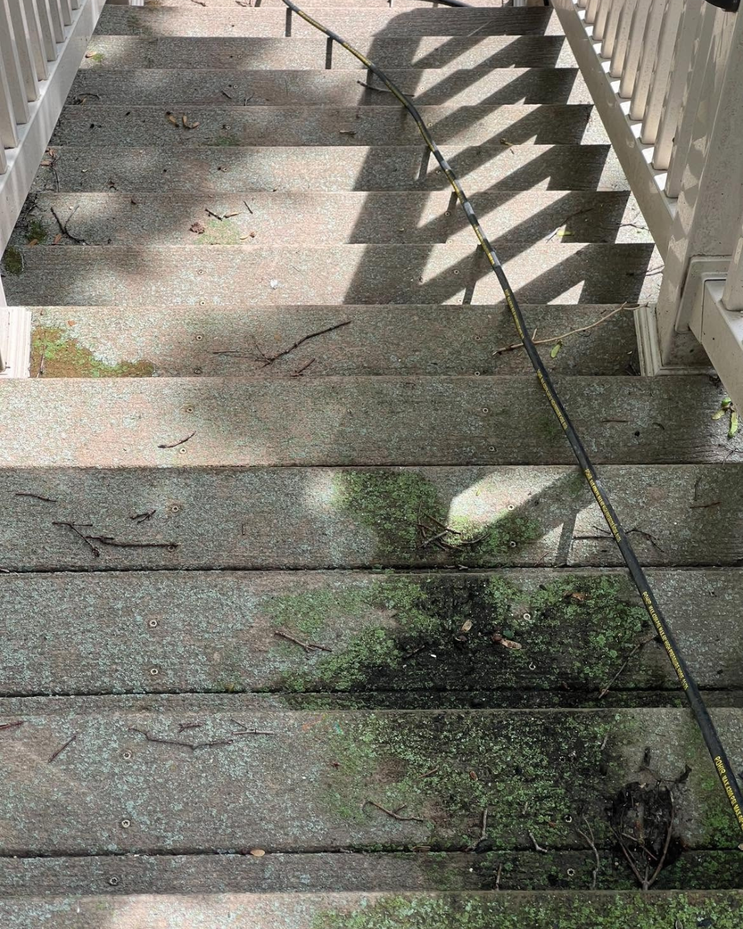 Porch stairs before and after cleaning